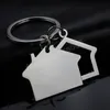 Porte-clés de maison moderne en métal ajouré pour femmes, breloque de sac de voiture unisexe, cadeau de noël, bijoux