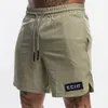 Pantalones cortos deportivos de secado rÃ¡pido para hombre entrenamiento transpirable fitness verano absorbente de sudor casual al aire libre pantalones de cinco puntos 220715