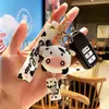 1pcs New Creative Silicone Animal Cows Keychains Personality Cartoon Cute Car Key Chain Ring Bag Pendant Christmas Present AA220318