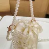 Borsa da sera Borsa di perle vuote per donna 2022 Nuova elegante pochette con pochette intrecciata a mano e borsa a tracolla piccola da donna 220622