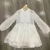 Robes décontractées Boho inspiré Sexy robe blanche plissée pour les femmes à manches longues à volants fête élégante Chic dames