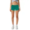 Sommar andas snabbtorkning sport hetty heta shorts kvinnors fasta färgficka som kör fiess byxor prinsessan sportkläder gym leggings