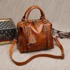 2022 New Vintage Genuine Leather Oil Wax Borse di lusso Borse da donna Designer Modis Borsa a tracolla Messenger Famous Brand Neutral Female