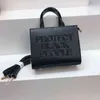 Borsa a tracolla da spiaggia estiva Borsa a tracolla in pelle con carattere Shopping Borsa da donna Proteggi le persone nere Borsa a tracolla Tote da donna 2022 G2205259N