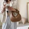 Borsette Borsa per gnocchi Ins francese dal design semplice Autunno Inverno Borsa da donna portatile con lacci intrecciati per la casa Borsa da polso da donna