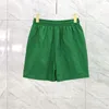 Roupa de banho masculina moda nova marca triângulo verde padrão swimtrunk casual cinco minutos calças de praia shorts masculino verão fino spo290n