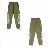 Pantalon cargo de créateur vert avec étoiles remplies de lettres de rue, de jogging, de lettres imprimées, en polaire technique, hip hop, surdimensionné, encre colorée, pompon à séchage rapide, YQ31