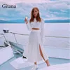 Gitana 2021 Kvinnor stickad veckad kjol kostym Sexig gröda topp och knapp split midi kjol 2 stycke uppsättning mode matchning set outfits t220729