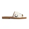 Tofflor Slide Designer Sandaler Dam Woody Platta Mules Slides Segel Canvas Vit Svart Dammode Strand Gummi Slipper skor