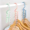 Hangers Racks Organizador de almacenamiento de plástico Ropa a prueba de viento de plástico Holleta de colgilla fija Hebilla Anti-Slip Hogar