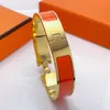 Ontwerp Bangle Hoge kwaliteit Vrouw Armband Designer Sieraden 4 Kleur Gouden Gesp Armbanden Rvs Mode-sieraden manchet Bangles