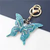 Butterfly Keychains автомобиль Ключ Кольца Держатель Женщины Мода Кристалл Горный Хрусталь Сумка Подвеска Подвески ОДВ Нарученные Украшения Подарочные Клейкие Цепи Сумки Аксессуары