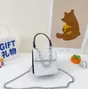Barns lilla handväska mångsidiga mode mini flicka tvärkropps väska prinsessan handväskor kedja enskilda axlar