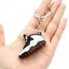 Anahtarlıklar Landards Creative 3D Mini Sneaker Ayakkabı Anahtarlıklar Erkek Kadınlar 17 Stil Yumuşak PVC Basketbol Spor Ayakkabıları Ana Zincir Çanta Araba Keytings Kolye Aksesuarları I5QC