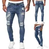 Mäns jeans män europeiska och amerikanska mäns byxor rippade personlighet slitna vit slim-fit denim mode fotbyxor