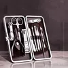 12pcs Manicura Set de acero inoxidable Clazo de clavos Pusher Pusher Spisor Tweezers Tools Kit