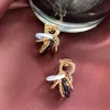 Kvinnors örnstänger dinglar ljuskronorörhängen flerskiktscirkelharts unikt formade b bokstäver hängande glänsande icke-blekande örhänge des2389