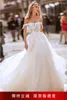 فستان الزفاف 2022 جديد عصري مثير واحد الكتف العروس السفر اطلاق النار الموقع البحرية زائدة بالجملة