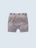 Pantaloncini con tasche oblique con dettaglio bottoni per bambini SHE01