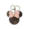 Marron Fleur Porte-clés Anneaux Dessin Animé En Cuir PU Arc Souris Or Porte-clés De Voiture Titulaire Mignon Sac Pendentif Charmes Design De Mode Bijoux Cadeaux Clé