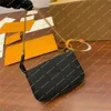 Dames modeontwerper handtas schoudertas hoogwaardige top 5a pochette accessoires mini reliëf koehide portemonnee m58009 m80732 sleutelzake zakje