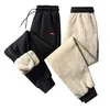 Męskie spodnie M-8xl Mężczyźni Sport Zimowe ciepłe spodnie dresowe Mężczyzna do joggingu plus duże ubrania z polaru Spodnie Joggersmen's Drak22