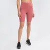 L066 Pantalones cortos de yoga de gran altura Pantalones de chándal casuales ajustados Sin línea en T Pantalones ajustados elásticos Pantalones cortos deportivos de color sólido Mujeres Nake Feeling Five Cents Pantalones