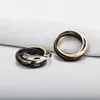 'Oro Argento Nero' Tre Anelli Incrociati Tripli Anelli per Donne Uomini Amanti Fede Nuziale in Acciaio al Titanio 316L Aneis Anel Bague Femme Anello dal Design Originale