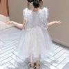 女の子のドレススウィートガールズプリンセスドレスドットプリントフリル半袖チュチュイブニングボールガウン