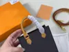 2022 Moda de verano Versátil Mini bolso de hombro Bolso de mensajero con estampado de letras Señoras de gran capacidad Moda Cartera con hebilla de metal al por mayor