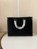 2022 Högkvalitativ stor handväska handväska designer fasion väskor kvinnors väska med bokstäver lady handväska klassiska presbyopiska axelväskor