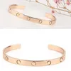 Lyxdesigner Öppning Skruv Bangle Women Rostfritt stål Pararmband Guld Fashion Jewelry Gift For Girl Friend Accessories Wholesale