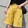 Jeans pour femmes en denim jaune pantalon à cinq points