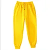 Nowe joggery dresowe mężczyźni i kobiety elastyczna talia tracić swobodne spodnie białe beżowe różowe żółte hip hop męskie spodnie dresowe G220713