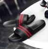 Designer de la marca de rayas parejas zapatillas zapatos de cuero calzado de verano moda mujer diapositivas hombres al aire libre plana mujer sandalias mulas