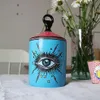 حامل شمعة Sky Sky with Hand Lid Porcelain Candle Jar European Style Creative Ceramic Big Eye Candle Holders239C