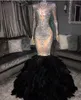 Eén stuks Sparkly Silver Sant Applicaties Mermaid Prom Dresses 2020 Sheer Neck Lange Mouwen met Black Feather Plus Size Formele Avond Gelegenheid Groeden
