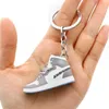 Creative 1/6 Hollow 3D Sneakers Model Keychains Souvenirs Basketball Shoes Sports Enthusiasts Keyring Car Backpack Pendant Gifts G220719