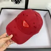 Män Damer Designer casquette metall triangel keps Bomull Solid Color Ripped Hat