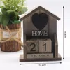 Figurine di oggetti decorativi 1 Set Calendario perpetuo da scrivania retrò Mini casa a forma di casa in legno Vecchio classico Decorazioni per la tavola di casa