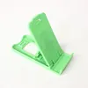 Mini supporto universale pieghevole per telefono Supporto da tavolo in plastica pieghevole portatile per iPhone Samsung Supporto per smartphone Xiaomi