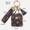 Designer Airpods Cases Keychains Rings Fashion Brown Flower Key Chains Women PU Leather Pendant Bag Charms Keyring Trinkets Car Keyfobs Holder Jewelry Accessories