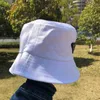 2022 Nuevo Primavera Verano Sombrero de cubo de lujo para mujeres Hombres Sombrero de pescador plegable al aire libre Niñas Niños Sombrero de sol de Panamá Y2204202656