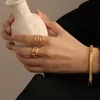 Boutique Amorita Bague élégante en or pour femmes avec éléments géométriques simples