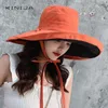 Mujeres de verano Moda de doble cara ancha Sombrero para el sol de ala grande Gorra de pescador de playa al aire libre Sombrero con protección solar a prueba de rayos UV Sombrero de cubo 220519319U