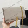 Lyxig Kate Medium Chain-väska med tofs i präglad krokodilglänsande läder med sammankopplade initialer i metall, avtagbar axelrem Crossbody