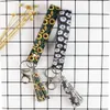 Quasten Leder Lanyards Armband Armbänder Schlüsselanhänger Halter Schlüsselring Plaid Grid Sonnenblumen Herz Muster Tasche Anhänger Geldbörsen CCE13791