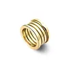 1,2 cm brede versie van de klassieke vijflaagse lente designer ring Europese mode mannen en vrouwen koppels trouwring verguld 18K goud 316L titanium stalen ringen sieraden