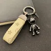 Designers keychain trend old flower highend keychains simple leather pendant personalized astronaut key chain ring9932141