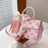 70% factory online sale handbag bag simple embossed hand-held One Shoulder style bow small square Bag